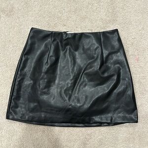 Black vegan leather Abercrombie skirt. Size medium. Worn a few times.